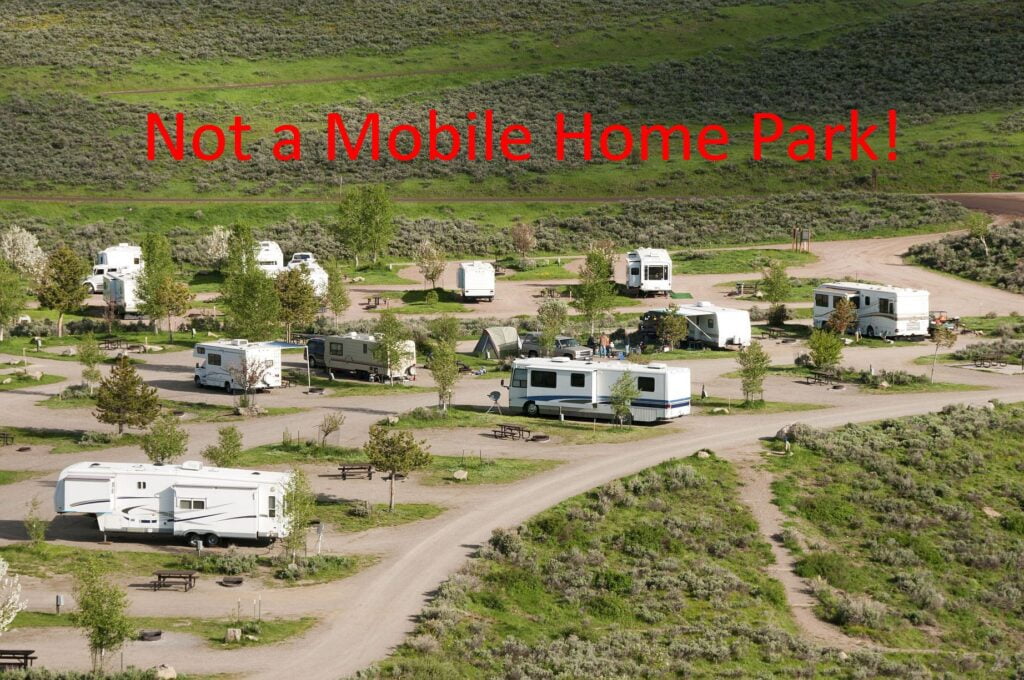 RVs, campers, motor homes trailers in a park-NotMHP
